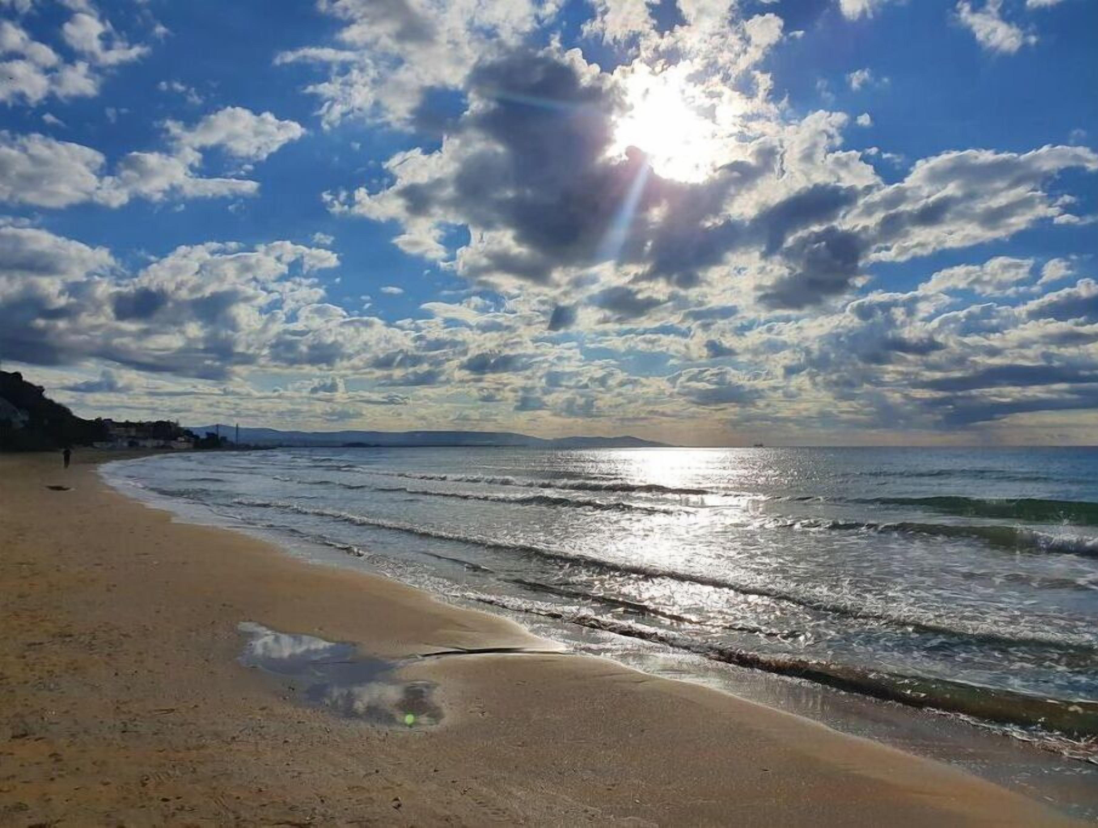 Una spiaggia nelle vicinanze, teli da spiaggia