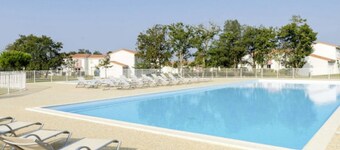 Quiet 2-Bedroom Holiday Home with Pool, Near Beach and Attractions