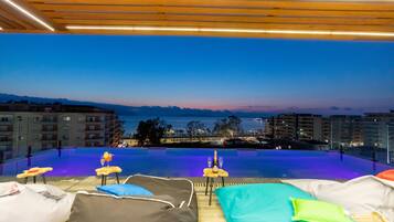 Outdoor pool, sun loungers