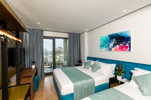 Triple Room, City View | Minibar, soundproofing, free WiFi, bed sheets