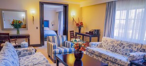 Presidential Room | Living room | 40-inch LCD TV with cable channels, TV - The Carousel Hotel (Hammanskraal)