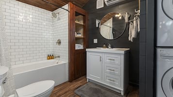 Bathtub, hair dryer, towels