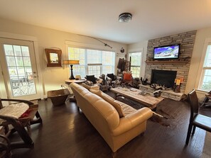 Smart TV, fireplace, DVD player, books