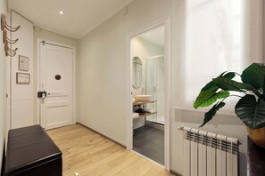 Shower, hair dryer, towels, shampoo