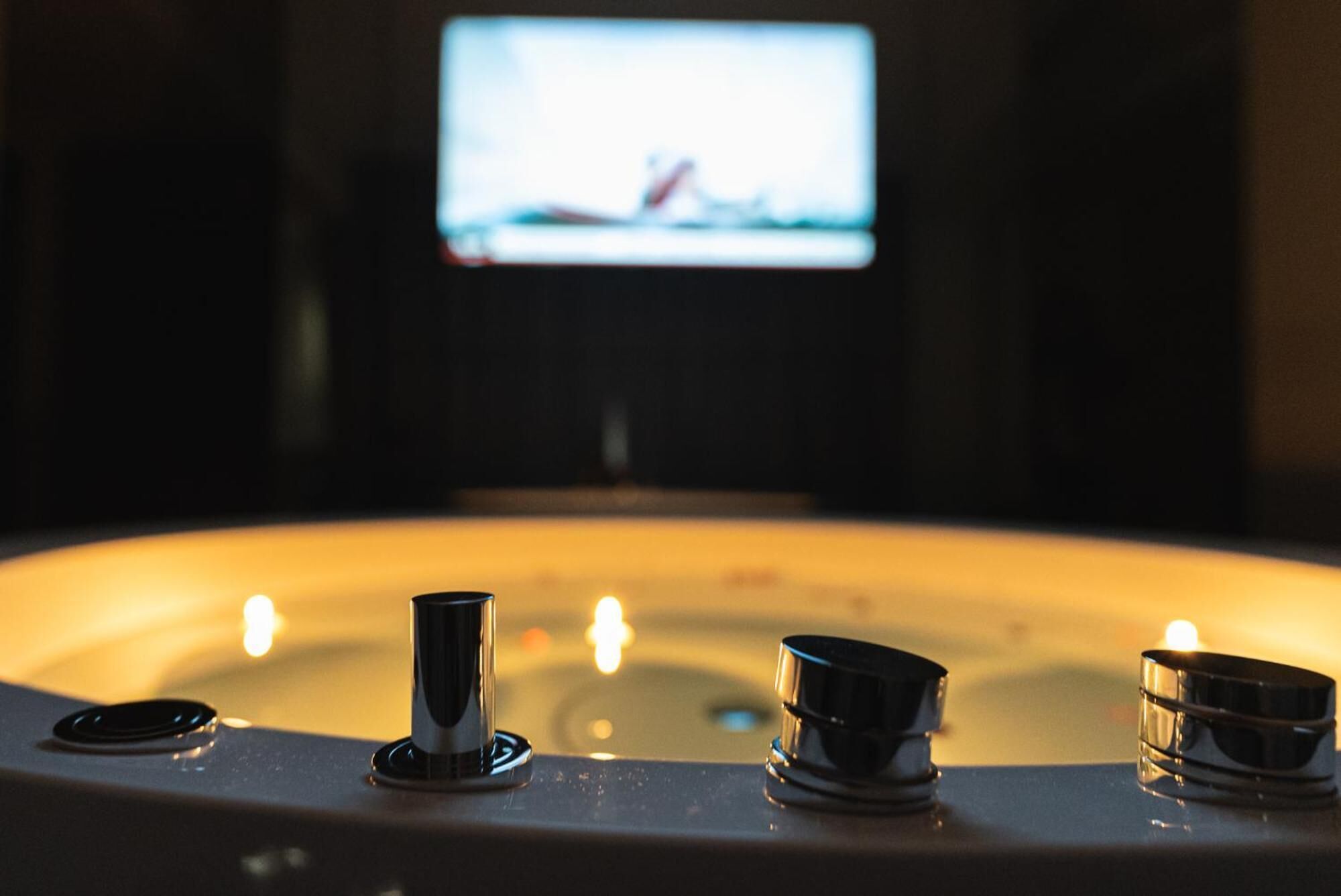 studio suite | bathroom | shower, rainfall showerhead, bidet, towels