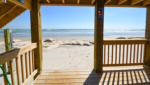 A wooden beach deck with a view of the ocean and beach. - Enjoy this oceanfront 3-bedroom Sea Rie-Treat, in North Topsail Beach. (North Topsail Beach)