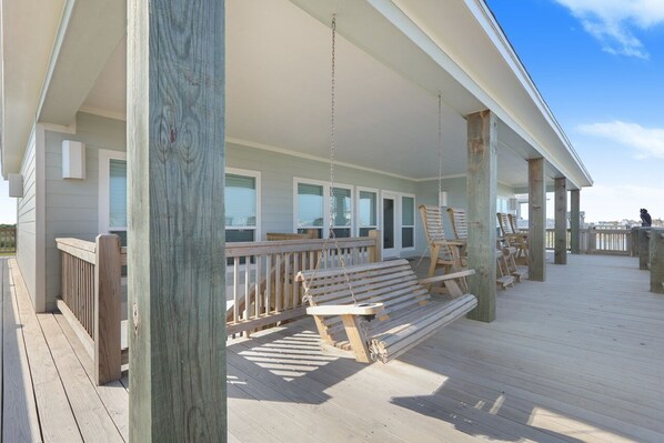 Relax on the outdoor deck with comfortable seating and take in the views.