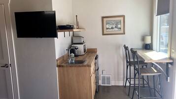 Microwave, coffee/tea maker, cookware/dishes/utensils