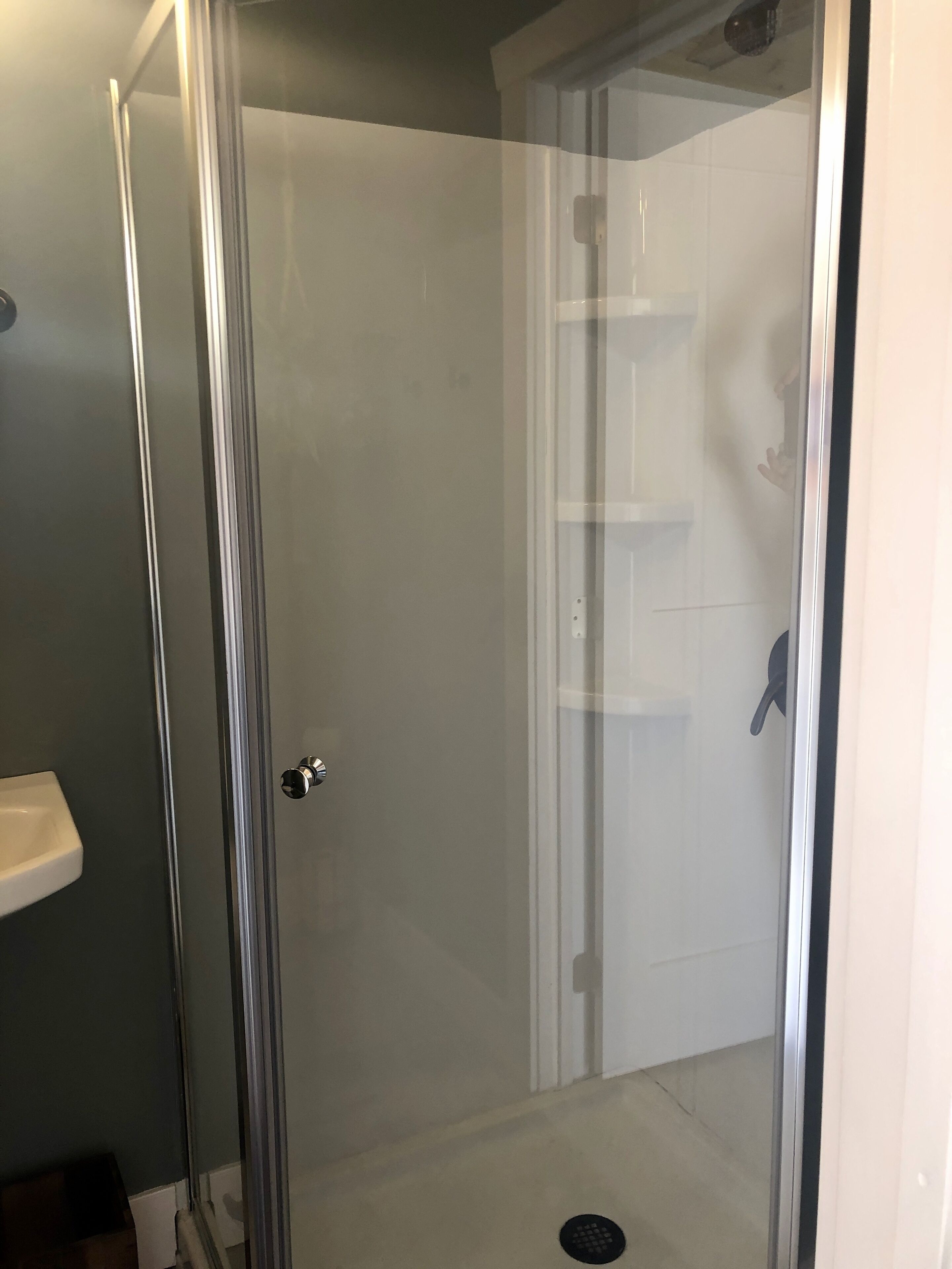 Shower, towels, soap, toilet paper