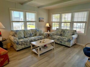TV, DVD player - Experience coastal charm at Dolphin Delight, a 3BR, 2BA home in Oak Island with ocean views. (Oak Island)