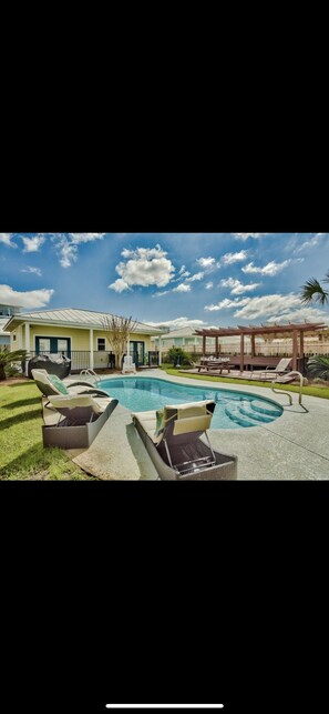 Outdoor pool, a heated pool - Sun City Crystal Beach 6-SEAT STREET LEGAL GOLF CART COMES WITH THIS RENTAL!!! (Destin)