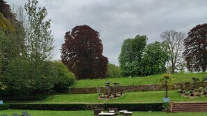 An outdoor buffet with a variety of fruits, cheeses, and nuts. - Château with Spa, Golf, Tennis, Basket, swimming pools, gardens.  (Villers-Bocage)