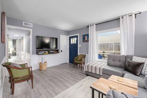 Smart TV, fireplace, books, music library