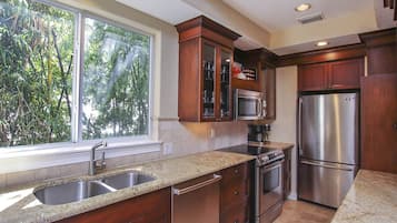 Microwave, coffee/tea maker, toaster, cookware/dishes/utensils