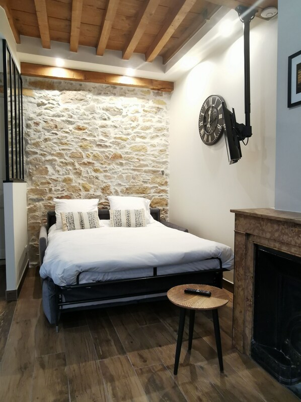 1 bedroom, desk, iron/ironing board, travel crib