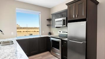 Premium Suite, Multiple Beds | Private kitchen