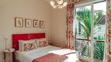 Deluxe kamer | Een minibar, een kluis op de kamer, geluiddichte muren, gratis wifi