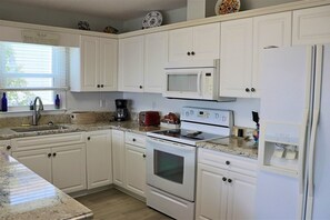 Fridge, microwave, dishwasher, coffee/tea maker