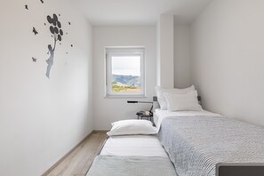 2 habitaciones, tabla de planchar con plancha, internet y ropa de cama 