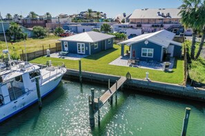Enjoy a peaceful retreat at the marina, surrounded by well-maintained lawns and a covered seating area.