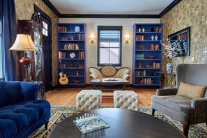 TV, fireplace, books