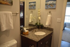 Combined shower/bathtub, hair dryer, towels, soap