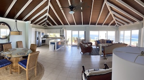 Enjoy a comfortable stay in this inviting space with a dining area, kitchen, and living area offering ocean views.