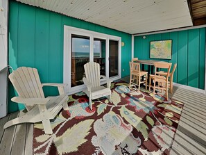 Outdoor dining - The Sandcastle @ Tiki | Oceanfront Condo! (Carolina Beach)