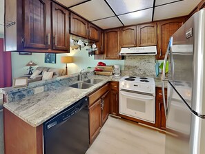 Fridge, microwave, oven, stovetop - The Sandcastle @ Tiki | Oceanfront Condo! (Carolina Beach)