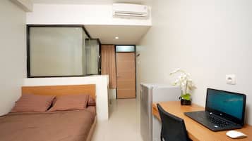 Habitación Deluxe | Escritorio, insonorización, wifi gratis y ropa de cama