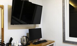 Standard Room | 1 bedroom, free minibar, individually decorated, individually furnished