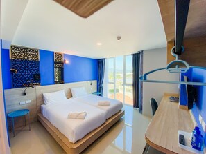 Standard Twin Room | Kannettavalle tietokoneelle sopiva työtila, pimennysverhot