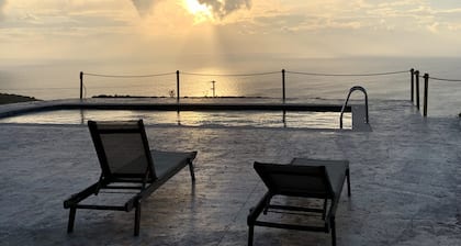 Authentic windmill villa , stunning sea view , live sunrise near the Shipwreck.