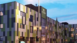 A multi-story hotel with a modern, geometric facade. - Large 5 Bed House / Wolverhampton + Parking (Wolverhampton)