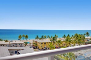 Enjoy breathtaking ocean views from this elevated hotel, surrounded by palm trees and a sparkling pool.