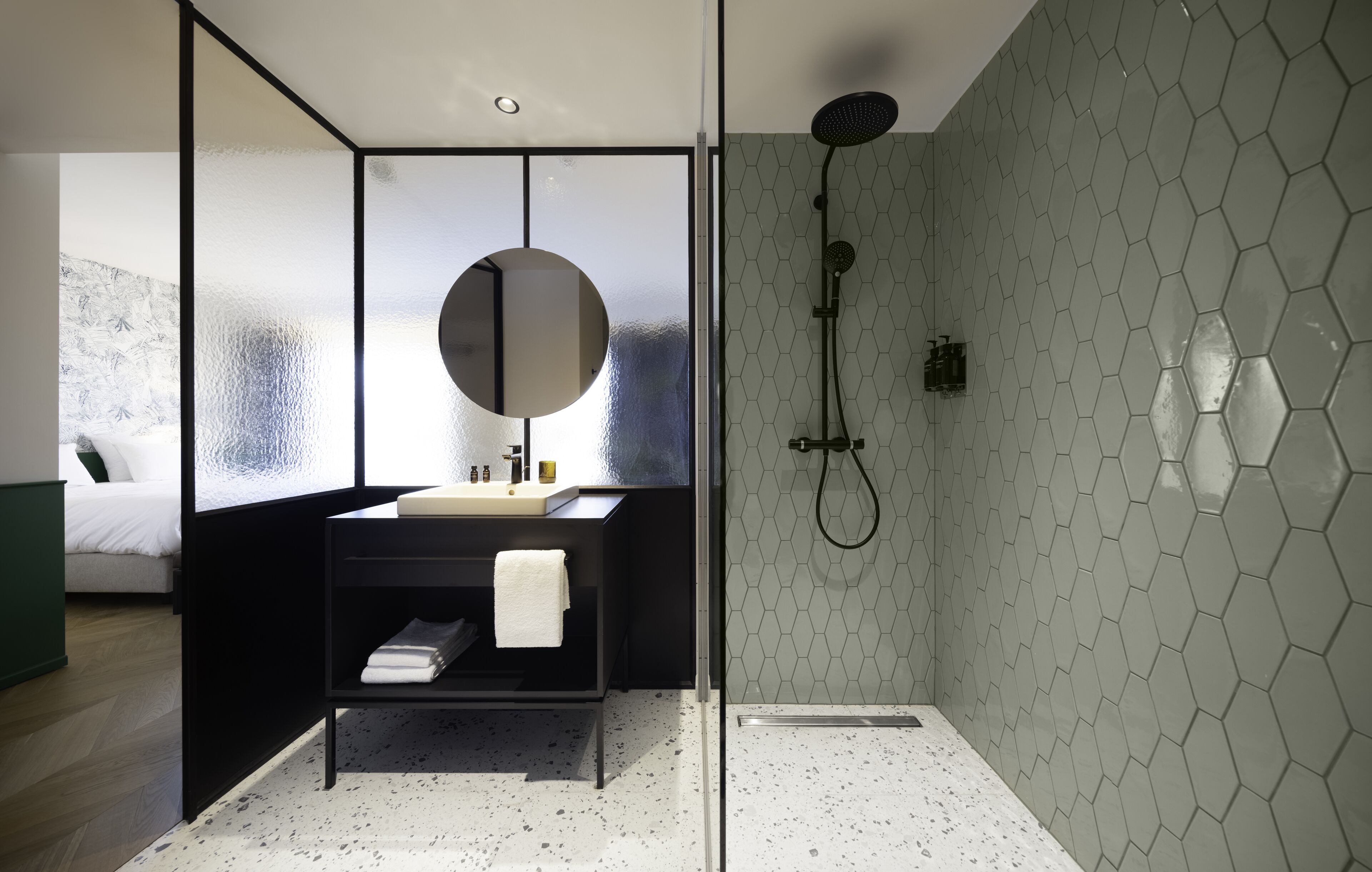 shower, rainfall showerhead, hair dryer, towels