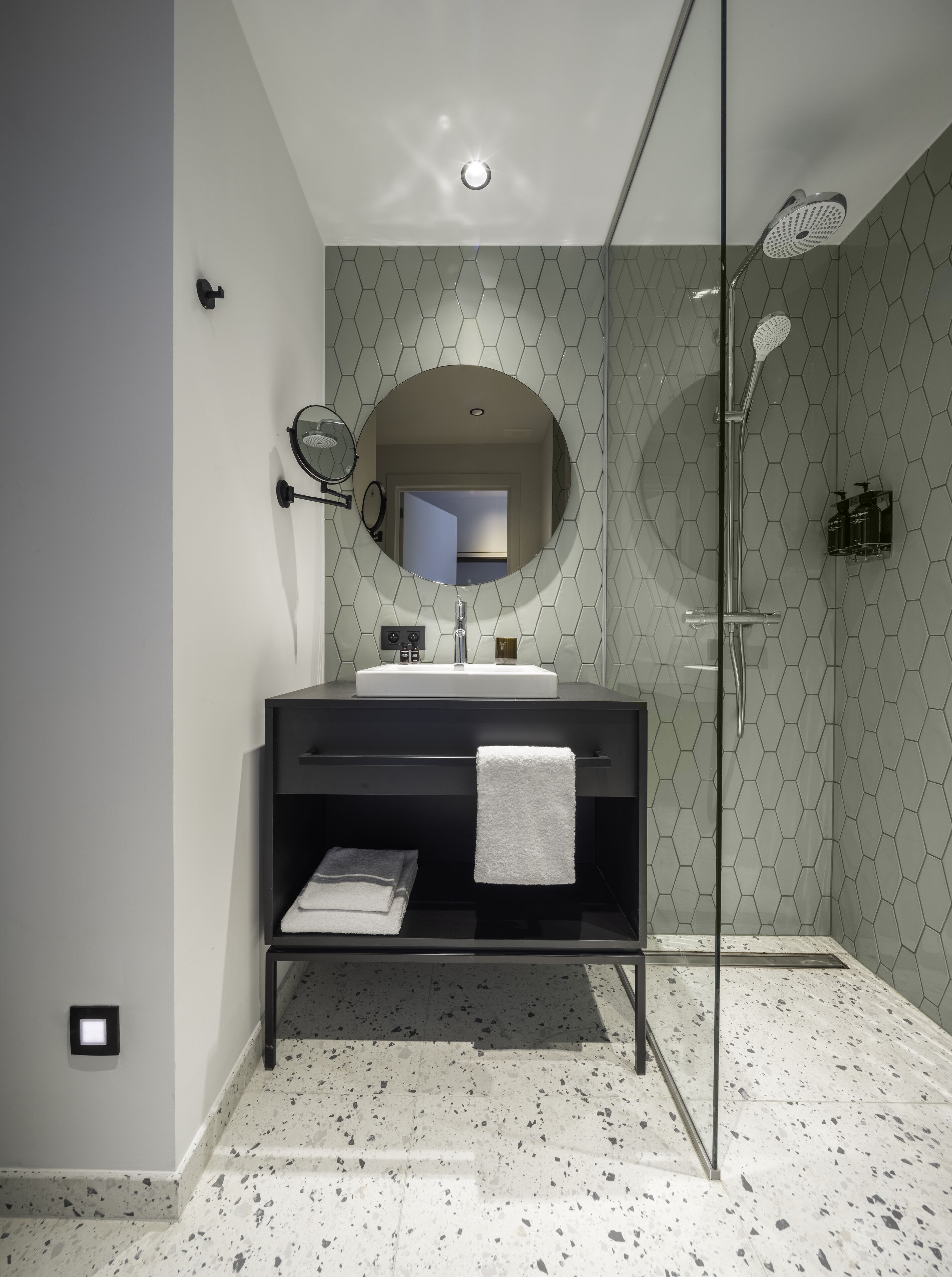 shower, rainfall showerhead, hair dryer, towels