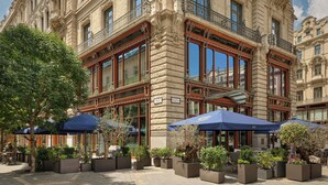 A historic building with ornate architecture, large windows, and outdoor seating with umbrellas. - Matild Palace, a Luxury Collection Hotel, Budapest (Budapest)