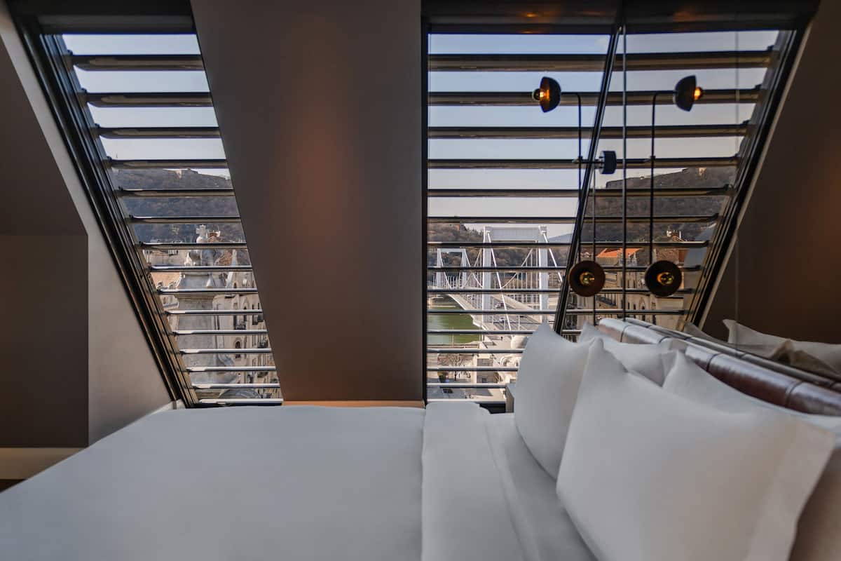 Suite, 1 King Bed, Non Smoking, City View (City View) | 1 bedroom, Frette Italian sheets, premium bedding, down comforters