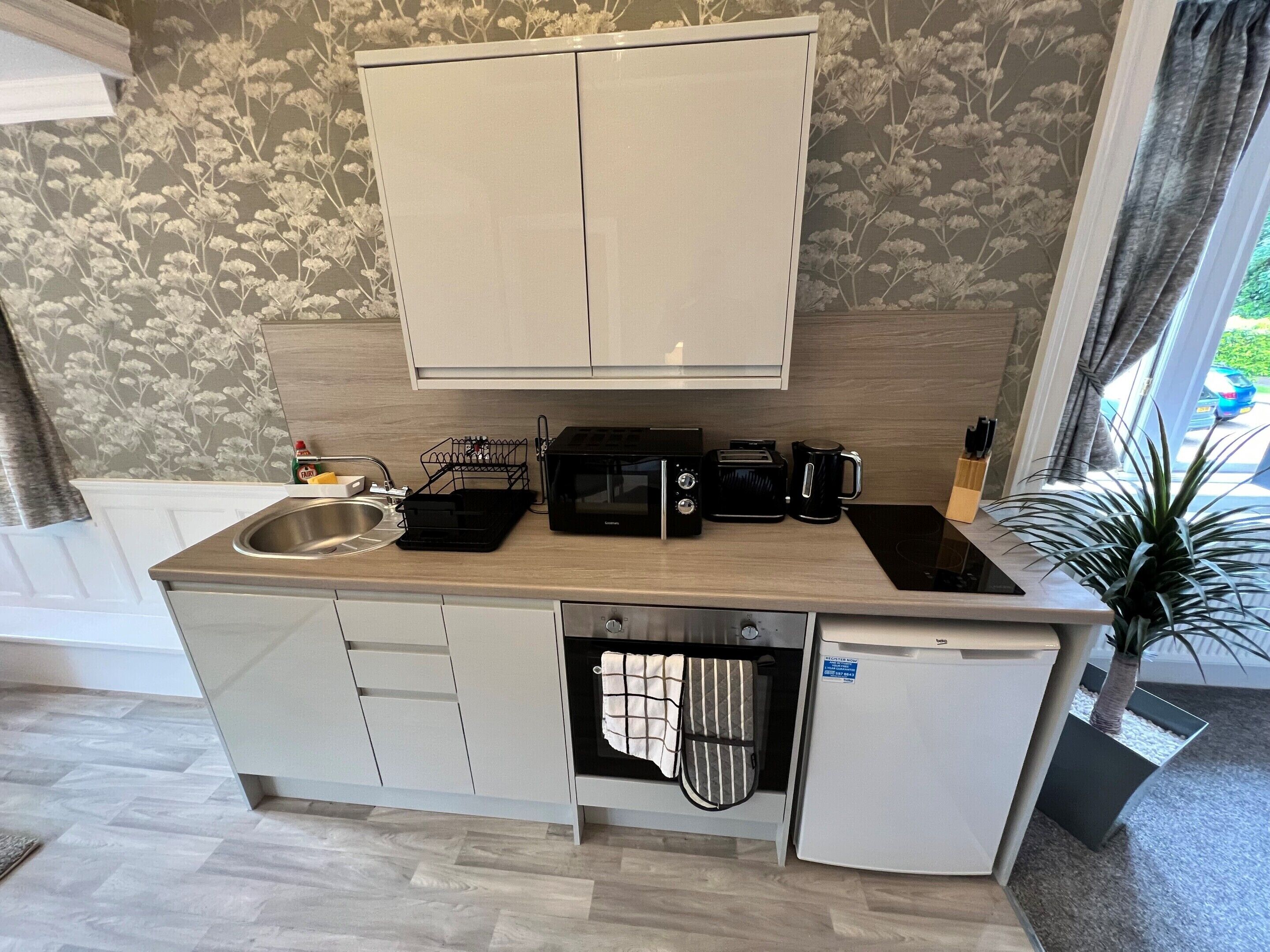 Luxury Studio, Private Bathroom (Superior) | Private kitchen | Highchair