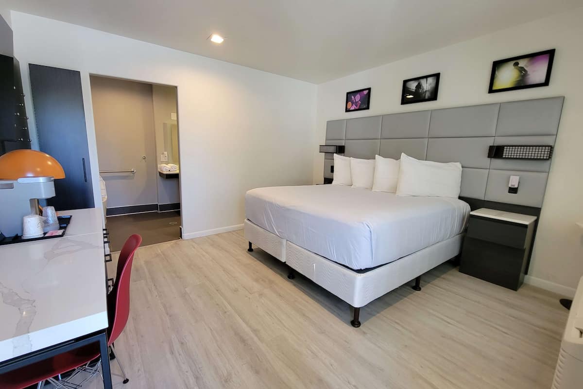 room, 1 king bed, accessible, non smoking | desk, iron/ironing board, bed sheets