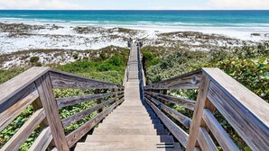 A wooden boardwalk leading to a beach with ocean views. - PoppyLu - Secluded Beachfront Home in Blue Mountain Beach with Private Pool & Golf Cart (Santa Rosa Beach)