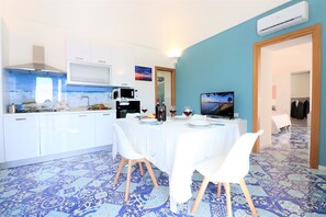 Appartamento Superior | Area soggiorno | TV a schermo piatto