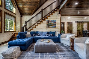 Smart TV, fireplace, foosball, books