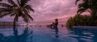 Charming houses with private beach and seaside pool