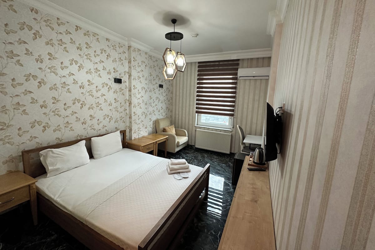 Economy Double Room | 1 bedroom, Egyptian cotton sheets, premium bedding, blackout drapes