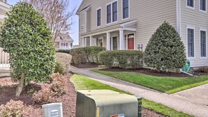 A residential building with a front porch, a mailbox, and a well-maintained lawn. - 4 Mi to Bethany Beach: Sunny Escape w/ Porches! (Ocean View)