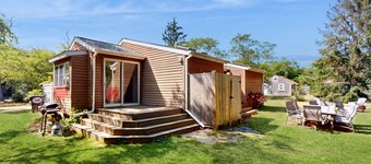 Charming dog-friendly home with large yard & WiFi - walk to beach & Great Pond