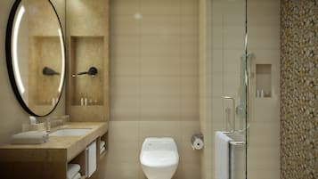 A modern bathroom with a large mirror, a sink, a toilet, and a shower area.