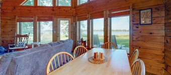 Private island getaway with beach access, lake views, wood stove, and WiFi